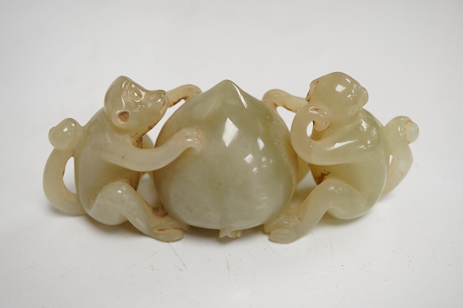 A Chinese jade monkey group and a bowenite jade elephant, largest 9cm wide. Condition - good (2)